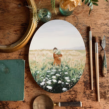 Load image into Gallery viewer, A fall field scene with a girl holding a large bunch of flowers
